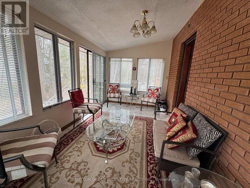 10 Celestine Court, Tiny, ON - Indoor Photo Showing Other Room With Fireplace