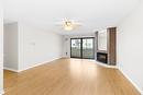 304-1490B Gordon Drive, Kelowna, BC  - Indoor With Fireplace 