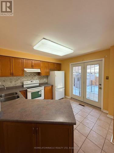 137 Pressed Brick Drive, Brampton, ON - Indoor Photo Showing Kitchen With Double Sink