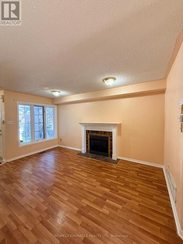 137 Pressed Brick Drive, Brampton, ON - Indoor Photo Showing Living Room With Fireplace