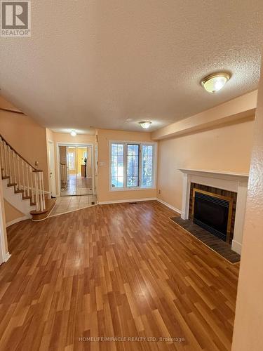 137 Pressed Brick Drive, Brampton, ON - Indoor Photo Showing Living Room With Fireplace