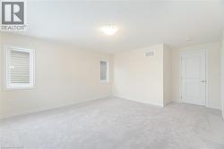 View of carpeted empty room - 