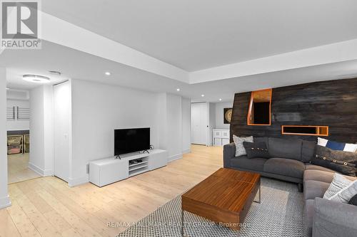 Lower level family room - 330 Winona Avenue, Ottawa, ON - Indoor Photo Showing Living Room With Fireplace