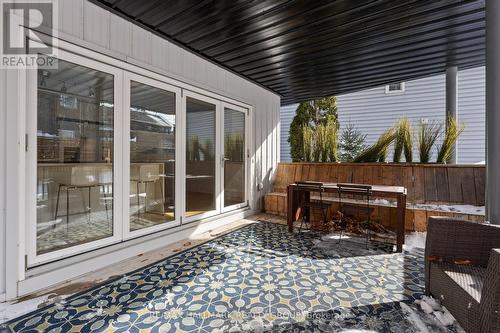 A custom folding glass door wall off kitchen - 330 Winona Avenue, Ottawa, ON - Outdoor With Deck Patio Veranda With Exterior
