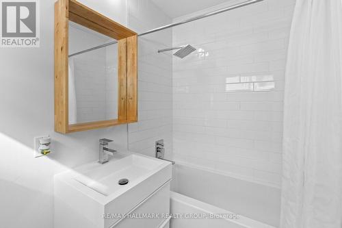 Second level main full bathroom with wood accents - 330 Winona Avenue, Ottawa, ON - Indoor Photo Showing Bathroom