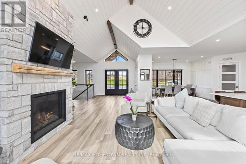 5 Shoreside Way, Augusta, ON - Indoor Photo Showing Living Room With Fireplace