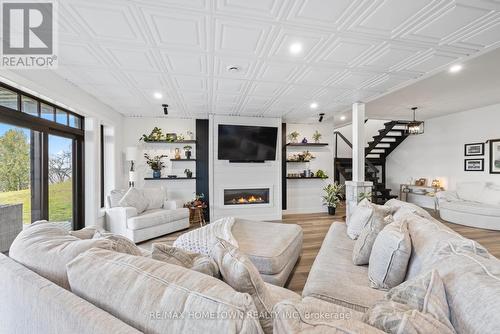 5 Shoreside Way, Augusta, ON - Indoor Photo Showing Living Room With Fireplace