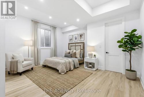 Large Basement bedroom/guest room virtually staged - 9 Earl Street, Mississauga, ON - Indoor Photo Showing Bedroom
