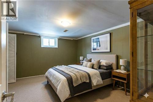 Basement level bedroom virtually staged with large closet - 102 Greeningdon Drive, Hamilton, ON - Indoor Photo Showing Bedroom