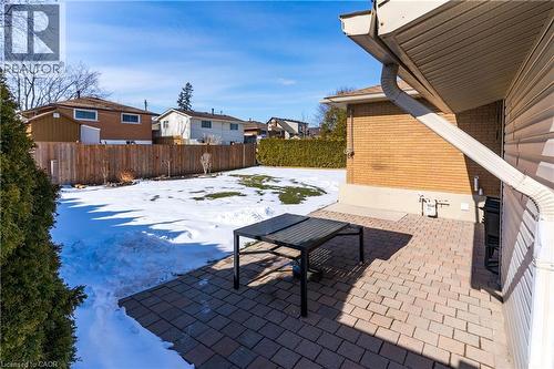 Fenced backyard featuring a new patio area and breezeway - 102 Greeningdon Drive, Hamilton, ON - Outdoor