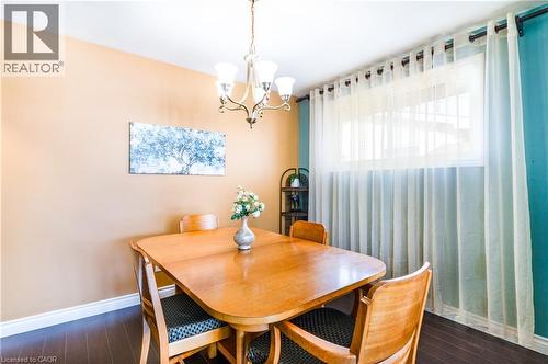 Dining room that can be easily converted to a third main floor bedroom - 102 Greeningdon Drive, Hamilton, ON - Indoor Photo Showing Dining Room
