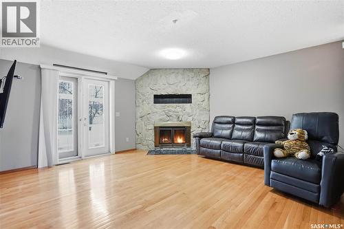 542 Kellough Road, Saskatoon, SK - Indoor Photo Showing Living Room With Fireplace