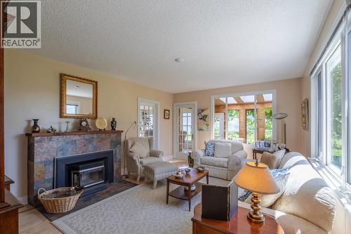 4910 Gartrell Road, Summerland, BC - Indoor Photo Showing Living Room With Fireplace