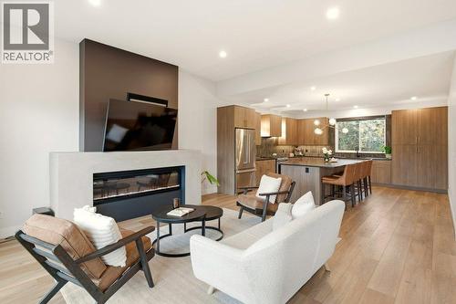 3309 Aspen Lane, Kelowna, BC - Indoor Photo Showing Living Room With Fireplace