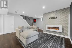cozy family room with wallmount gas fireplace - 