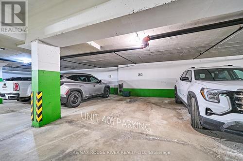 15 Paces from Entrance to Elevator - 401 - 337 Simcoe Street, Oshawa (O'Neill), ON - Indoor Photo Showing Garage