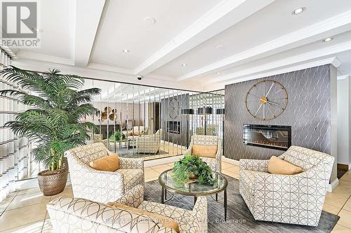 401 - 337 Simcoe Street, Oshawa (O'Neill), ON - Indoor With Fireplace