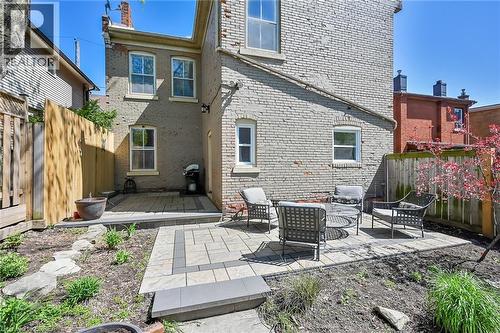 Rear view of property featuring a patio area - 40 Locke Street S, Hamilton, ON - Outdoor With Deck Patio Veranda