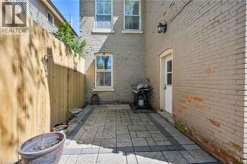 View of patio / terrace featuring a grill - 40 Locke Street S, Hamilton, ON - Outdoor With Exterior