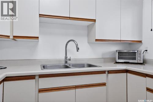 13 1128 Mckercher Drive, Saskatoon, SK - Indoor Photo Showing Kitchen With Double Sink