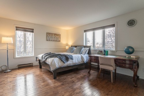 Chambre à coucher - 8940 Boul. Marie-Victorin, Brossard, QC - Indoor Photo Showing Bedroom