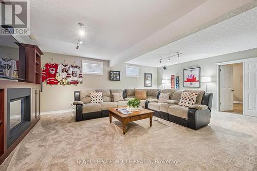 44 Crane Crescent, Woolwich, ON - Indoor Photo Showing Living Room With Fireplace
