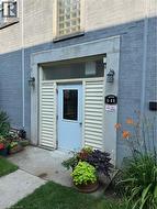 Entrance to property with brick siding - 