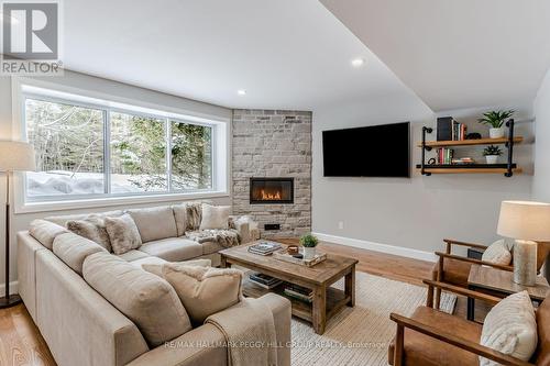 780 Marshall Road, Tiny, ON - Indoor Photo Showing Living Room With Fireplace