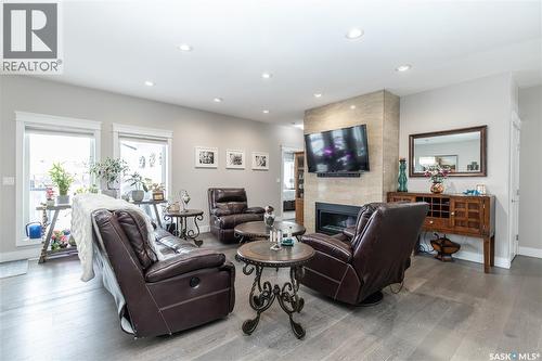 670 Atton Crescent, Saskatoon, SK - Indoor Photo Showing Living Room With Fireplace