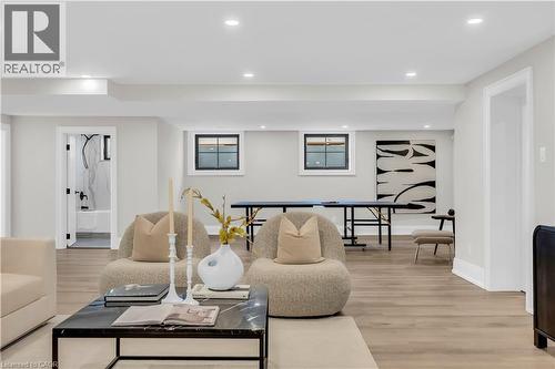 Living room with light wood-style floors and recessed lighting - 841 Danforth Place, Burlington, ON - Indoor Photo Showing Living Room
