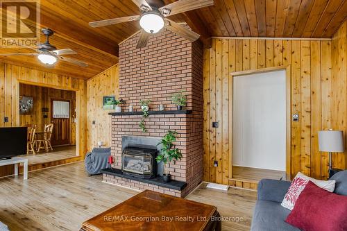 69 Albert Avenue, Tiny, ON - Indoor Photo Showing Living Room With Fireplace