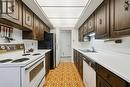 1801 - 1300 Bloor Street, Mississauga, ON  - Indoor Photo Showing Kitchen With Double Sink 