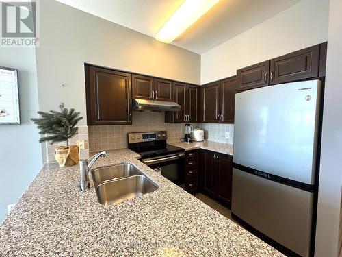 Ph05 - 7373 Kennedy Road, Markham, ON - Indoor Photo Showing Kitchen With Double Sink