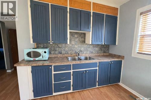 1600 Chaplin Street E, Swift Current, SK - Indoor Photo Showing Kitchen With Double Sink