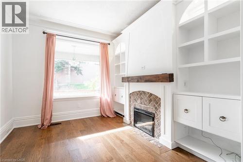 11 Lorne Avenue, Hamilton, ON - Indoor Photo Showing Other Room With Fireplace