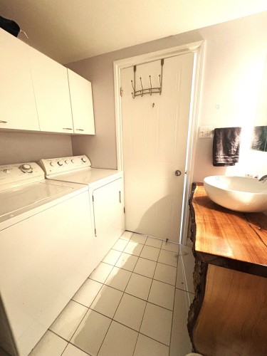 Salle de lavage - 201-95 Rue Pierre-Laporte, Saint-Eustache, QC - Indoor Photo Showing Laundry Room