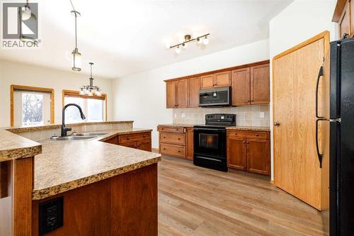 6010 Orr Drive, Red Deer, AB - Indoor Photo Showing Kitchen With Double Sink