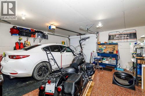 37 Regatta Way, Sylvan Lake, AB - Indoor Photo Showing Garage