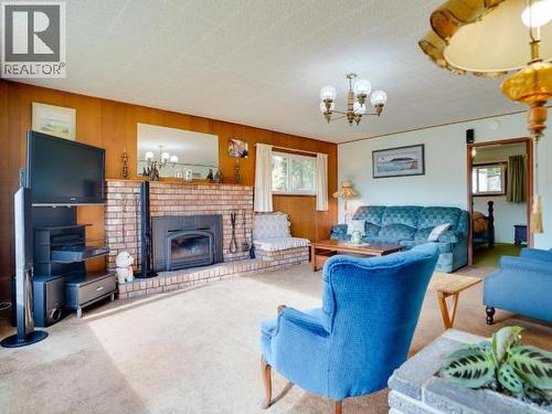 2468 Zilinsky Road, Powell River, BC - Indoor Photo Showing Living Room With Fireplace