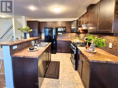 1 - 582 Hyde Park Road, London North (North O), ON - Indoor Photo Showing Kitchen With Double Sink