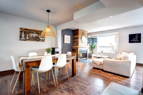 Salle à manger - 339 Rue De La Légende, Sainte-Adèle, QC - Indoor Photo Showing Dining Room With Fireplace