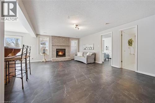 663 Heathcliffe Place, Waterloo, ON - Indoor Photo Showing Living Room With Fireplace