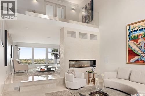 323 Mallin Crescent, Saskatoon, SK - Indoor Photo Showing Living Room With Fireplace