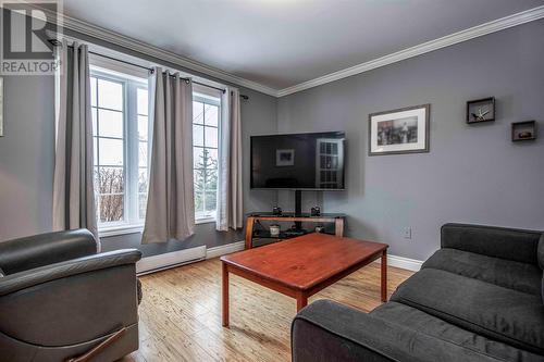 Family room at front of house - 34 Blackstrap Path, Conception Bay South, NL - Indoor Photo Showing Living Room
