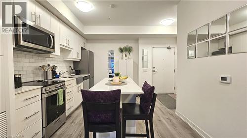 247 Northfield Drive E Unit# 507, Waterloo, ON - Indoor Photo Showing Kitchen With Upgraded Kitchen