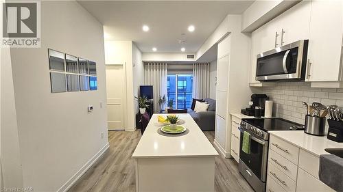 247 Northfield Drive E Unit# 507, Waterloo, ON - Indoor Photo Showing Kitchen With Upgraded Kitchen