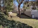 Fenced backyard with a wooden deck - 132 Forest Hill Drive, Kitchener, ON  - Outdoor 