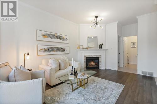 1 Watson Crescent, Central Elgin, ON - Indoor Photo Showing Living Room With Fireplace