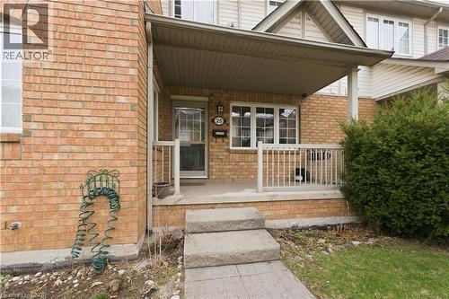Doorway to property featuring a porch and brick siding - 100 Beddoe Drive Unit# 25, Hamilton, ON - Outdoor With Deck Patio Veranda With Exterior