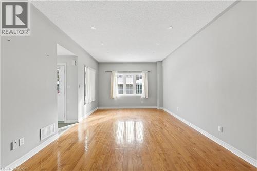 Spare room featuring hardwood - 100 Beddoe Drive Unit# 25, Hamilton, ON - Indoor Photo Showing Other Room
